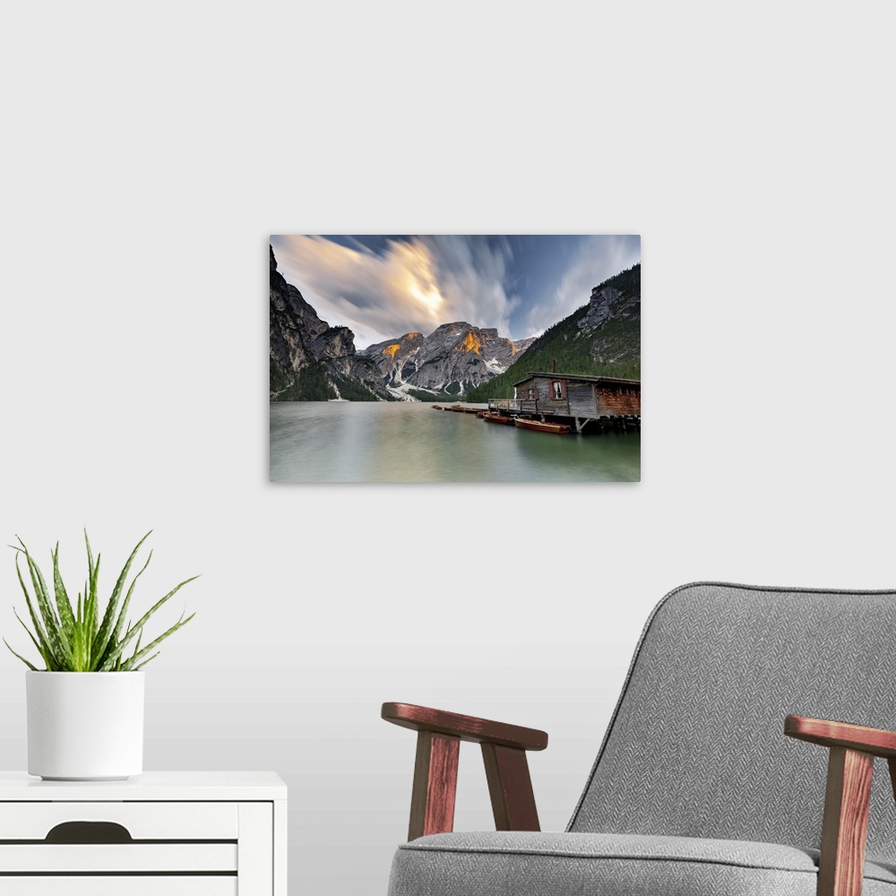 A modern room featuring Cloudy sky at sunset over Croda del Becco and Lake Braies (Pragser Wildsee), Dolomites, South Tyr...