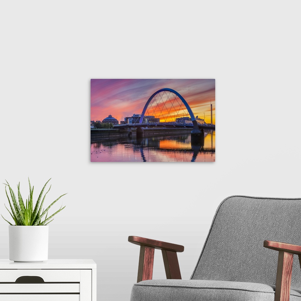 A modern room featuring Clyde Arc (Squinty Bridge) at sunset, Glasgow, Scotland, United Kingdom, Europe