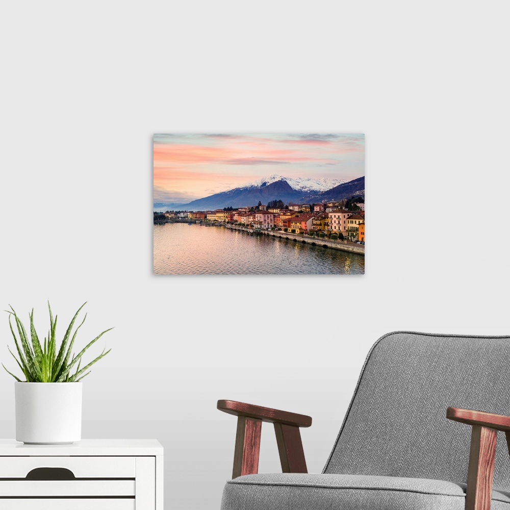 A modern room featuring Colorful houses of Gravedona and mountains at dawn, Lake Como, province of Como, Lombardy, Italia...