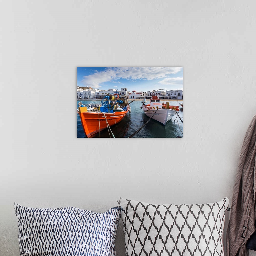 A bohemian room featuring Colourful boats in harbour, whitewashed Mykonos Town with windmills and churches, Mykonos, Cyclad...