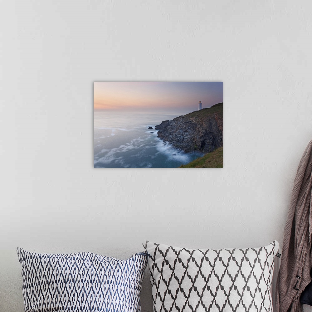 A bohemian room featuring A peaceful dusk on Cornwall's Atlantic coast, showing the lighthouse at Trevose Head, near Padsto...