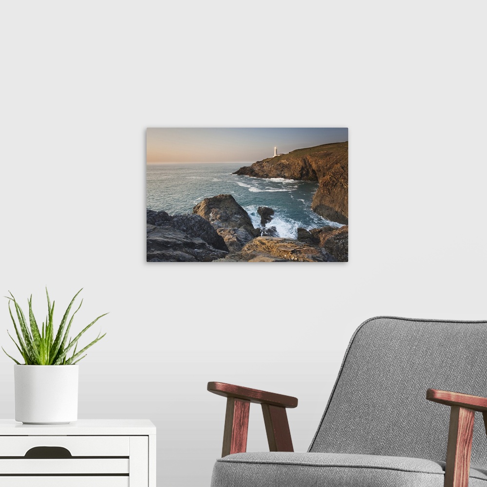 A modern room featuring A peaceful dusk on Cornwall's Atlantic coast, showing the lighthouse at Trevose Head, near Padsto...