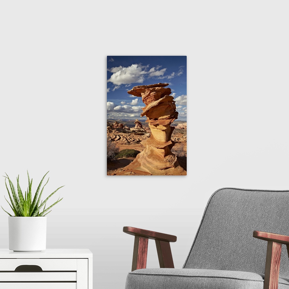 A modern room featuring Layered sandstone column under clouds, Coyote Buttes Wilderness, Vermillion Cliffs National Monum...