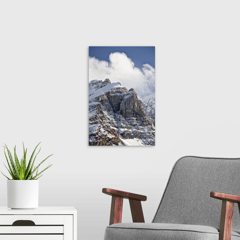 A modern room featuring Craggy mountains with clouds and snow cover, Jasper National Park, Alberta, Canada