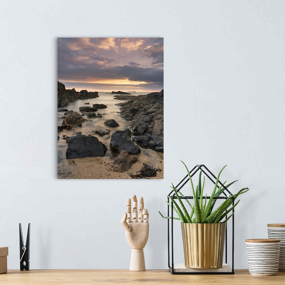 A bohemian room featuring Dawn breaking over Bamburgh beach and the Farne Islands, Northumberland, England, United Kingdom,...