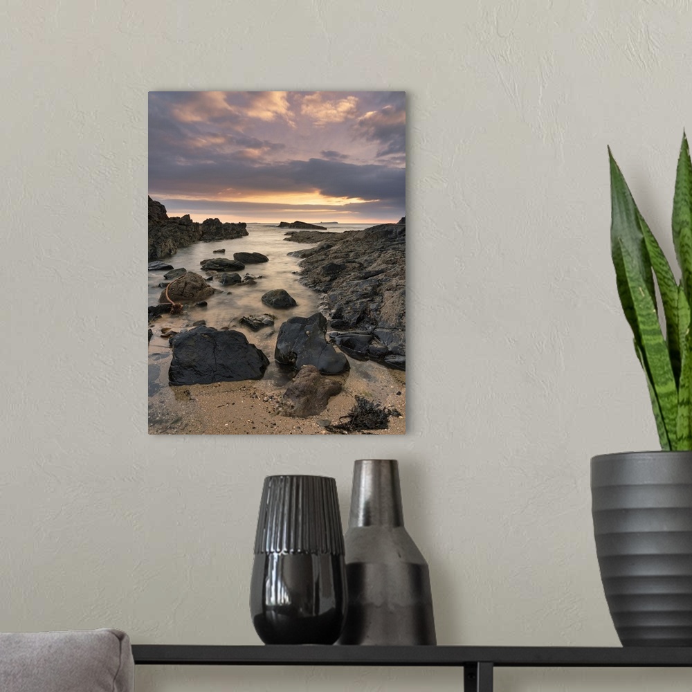 A modern room featuring Dawn breaking over Bamburgh beach and the Farne Islands, Northumberland, England, United Kingdom,...