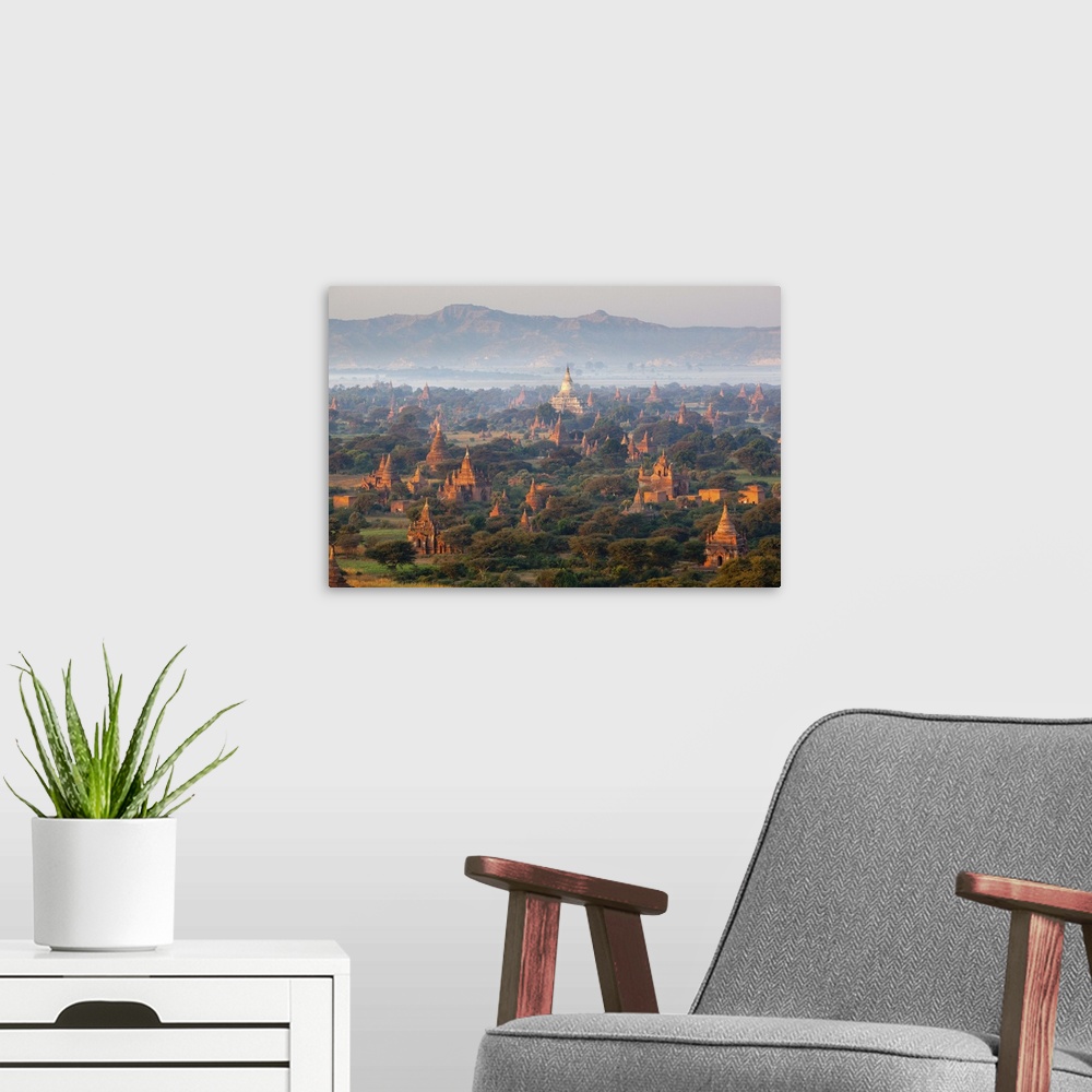 A modern room featuring Dawn over ancient temples from hot air balloon, Bagan (Pagan), Central Myanmar, Myanmar (Burma), ...