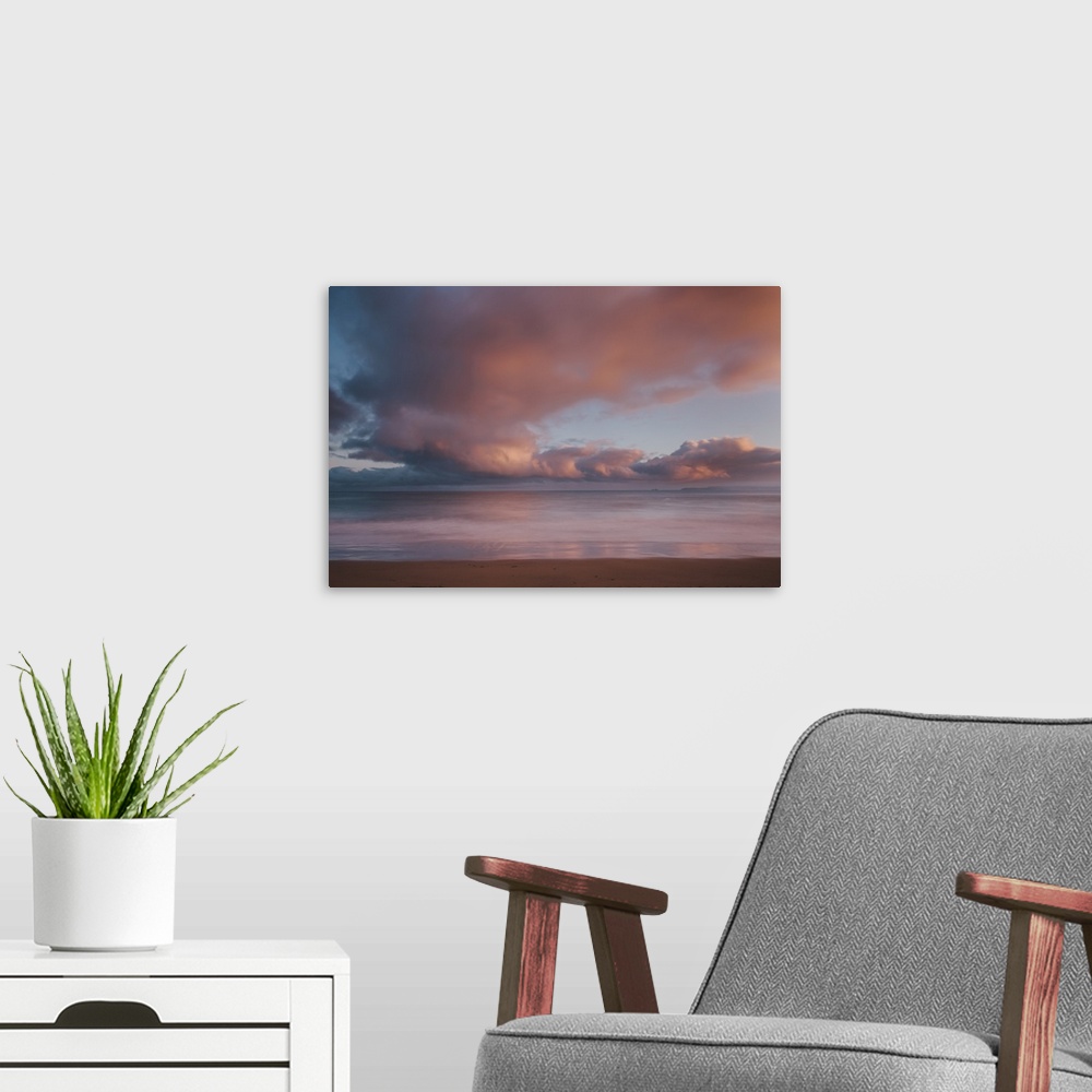 A modern room featuring Dawn sky over Carbis Bay beach, Cornwall, England, UK