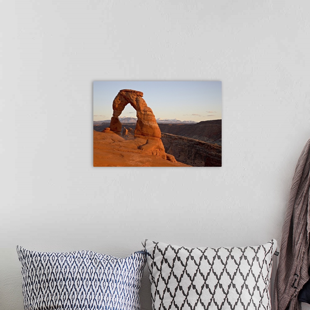 A bohemian room featuring Delicate Arch at sunset, Arches National Park, Utah