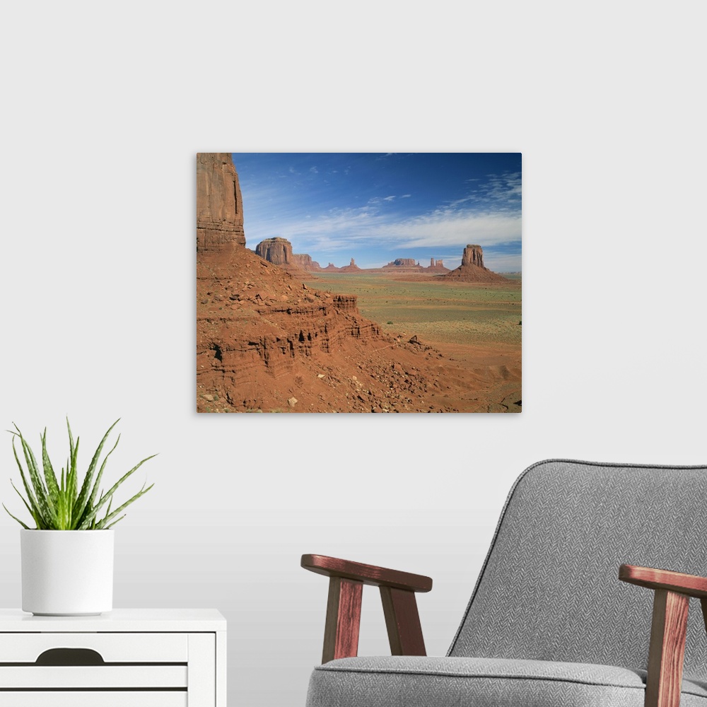 A modern room featuring Desert landscape with rock formations in Monument Valley, Arizona