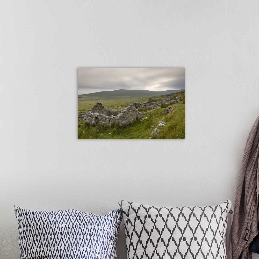 A bohemian room featuring Deserted village at the base of Slievemore mountain, Connacht, Republic of Ireland