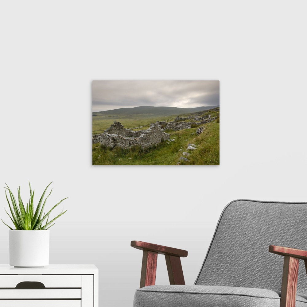 A modern room featuring Deserted village at the base of Slievemore mountain, Connacht, Republic of Ireland