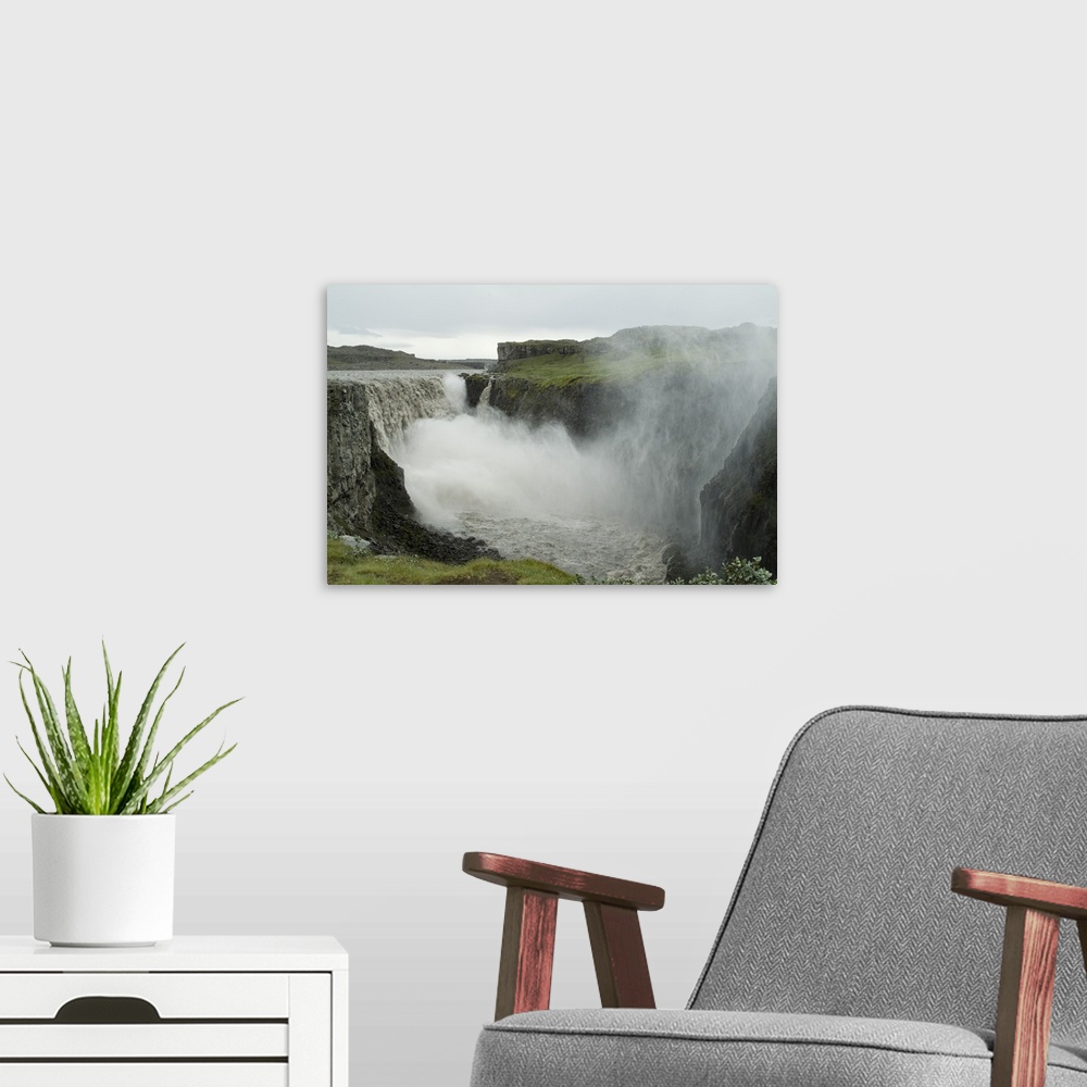 A modern room featuring Dettifoss Falls, Iceland