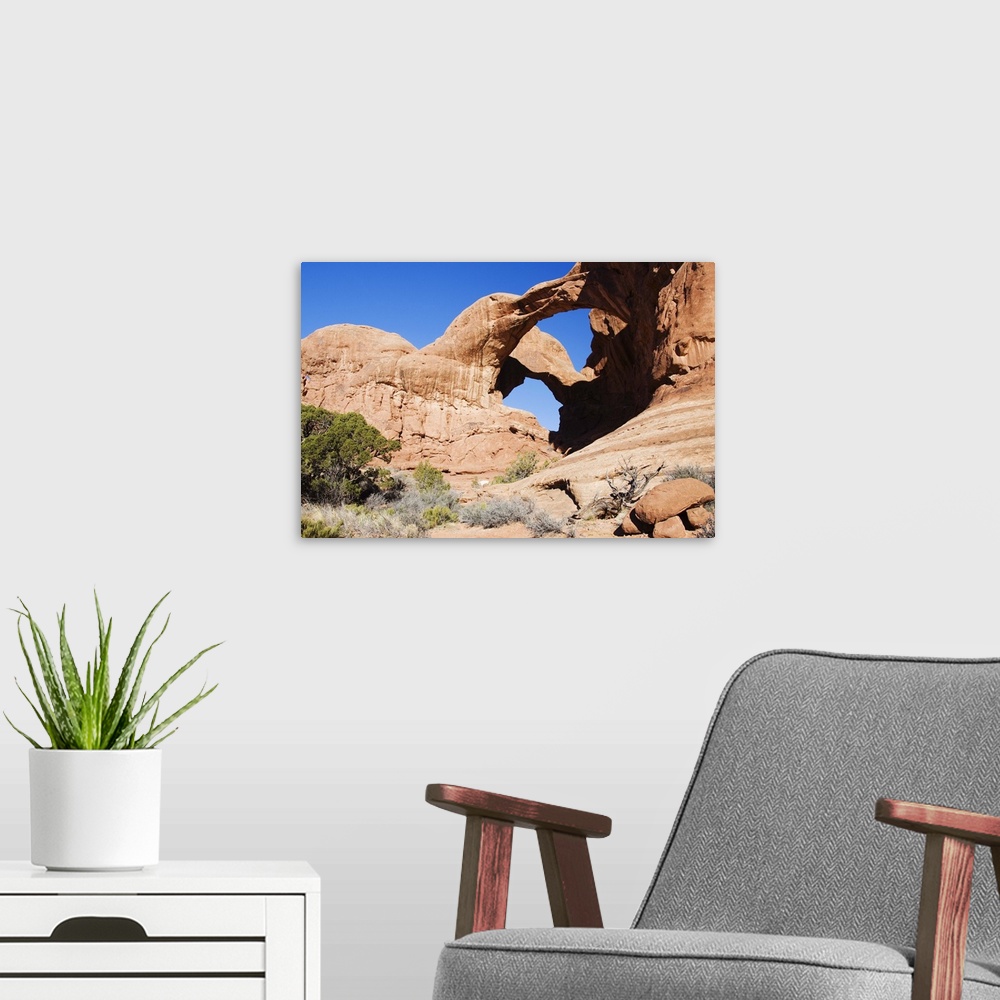 A modern room featuring Double Arch in the Windows section of Arches National Park, Utah