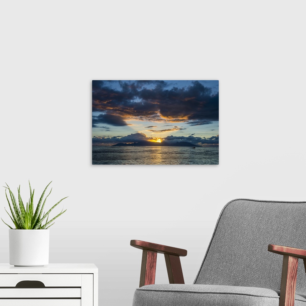 A modern room featuring Dramatic sunset over Moorea, Papeete, Tahiti, Society Islands, French Polynesia