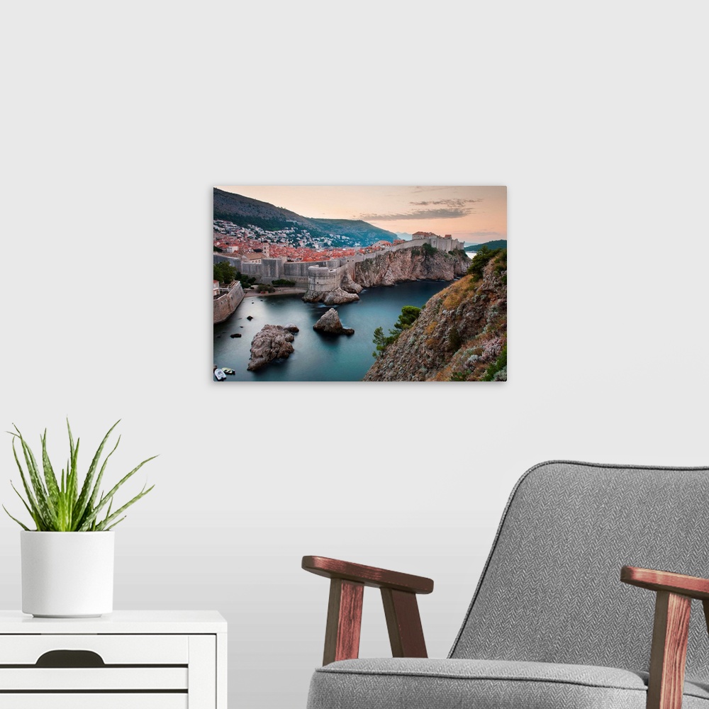A modern room featuring Dubrovnik and the City Walls at sunrise, Dubrovnik, Croatia