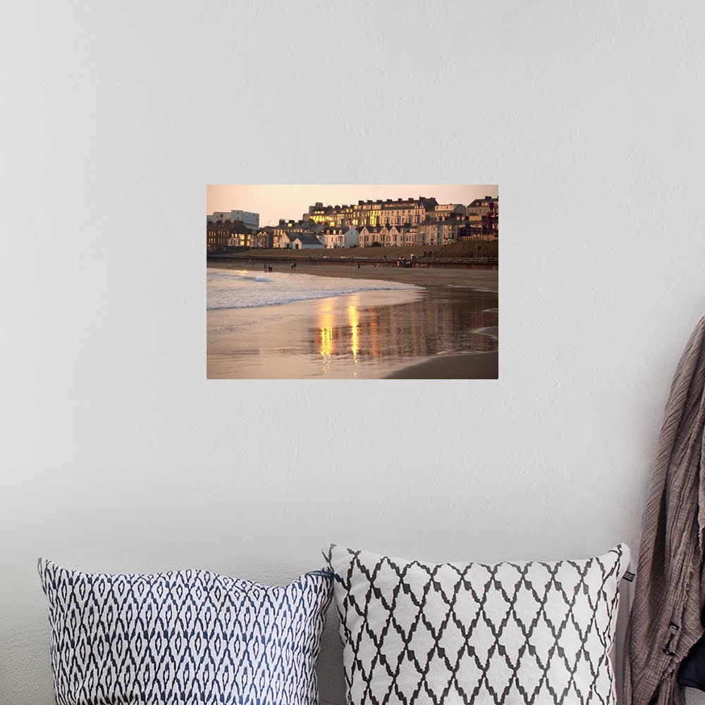 A bohemian room featuring Dusk light on the beach at Portrush, County Antrim, Ulster, Northern Ireland, UK