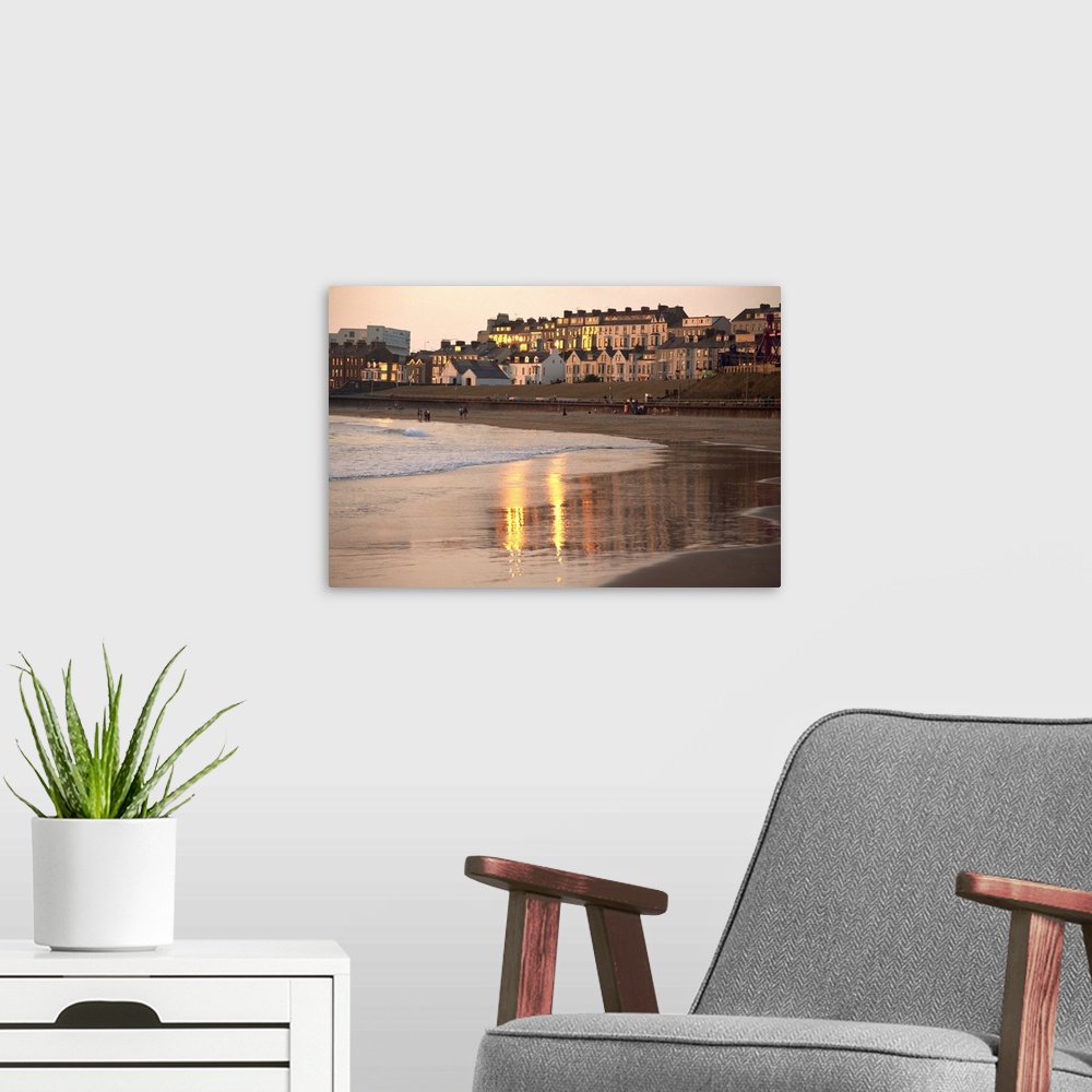 A modern room featuring Dusk light on the beach at Portrush, County Antrim, Ulster, Northern Ireland, UK