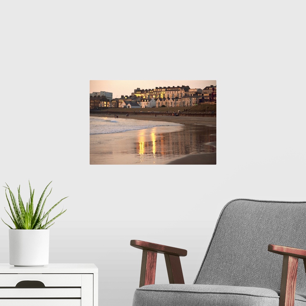 A modern room featuring Dusk light on the beach at Portrush, County Antrim, Ulster, Northern Ireland, UK