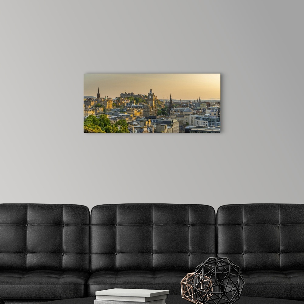 A modern room featuring View of Edinburgh Castle, Balmoral Hotel and city skyline from Calton Hill at golden hour, Edinbu...