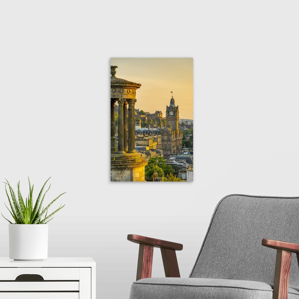 A modern room featuring View of Edinburgh Castle, Balmoral Hotel and Dugald Stewart monument from Calton Hill at golden h...