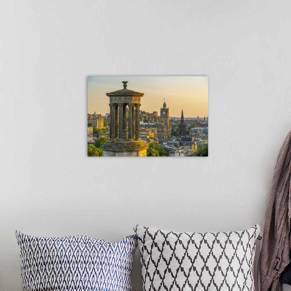 A bohemian room featuring View of Edinburgh Castle, Balmoral Hotel and Dugald Stewart monument from Calton Hill at golden h...