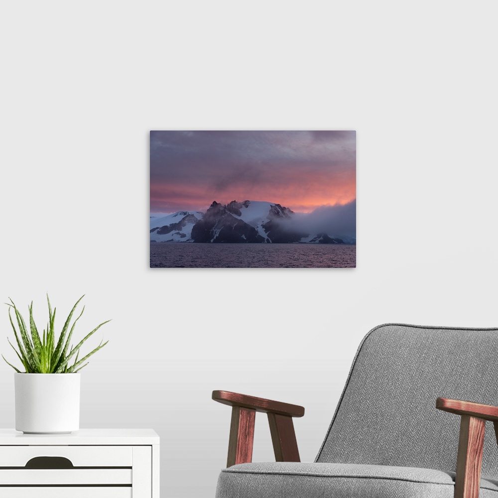 A modern room featuring English Strait at sunset, Antarctica
