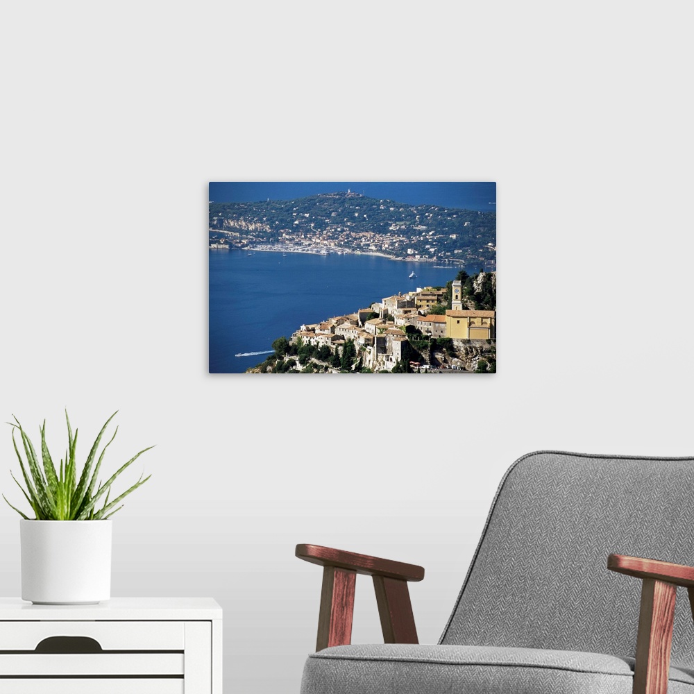 A modern room featuring Eze village and Cap Ferrat in background, Provence, French Riviera, France