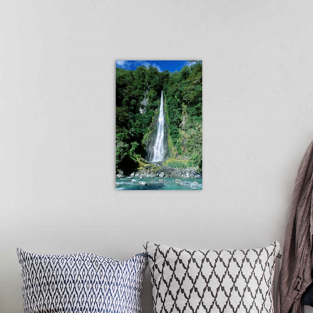 A bohemian room featuring Fantail waterfall by the Makarpra River, west Otago, New Zealand
