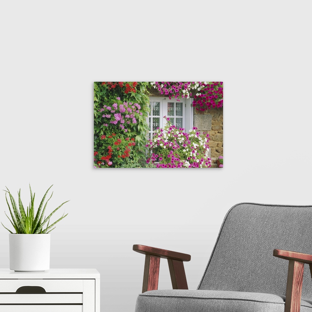A modern room featuring Farmhouse window surrounded by flowers, lIle-et-Vilaine, Brittany, France