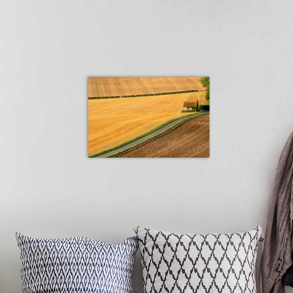 A bohemian room featuring Fields and rural road near Old Winchester Hill, Hampshire, England, UK