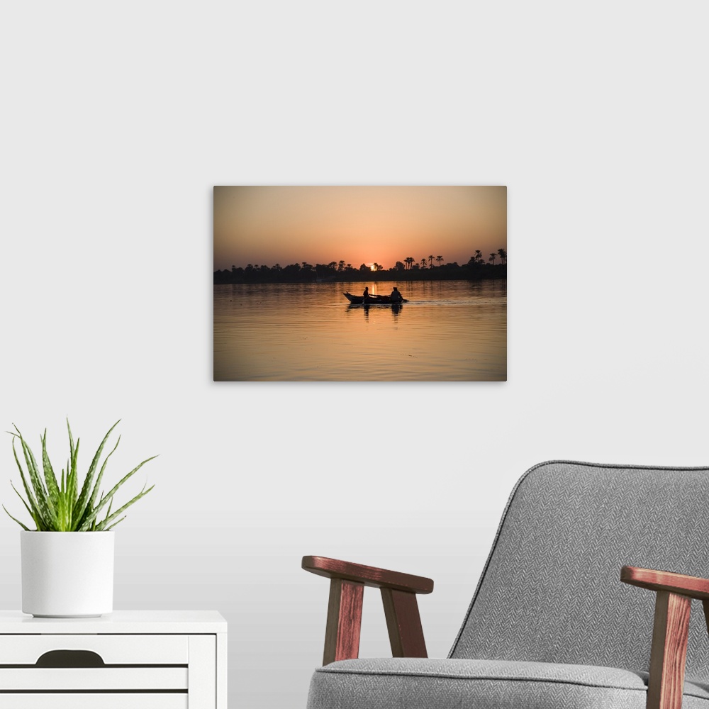 A modern room featuring Fishing boat, sunset, River Nile, Egypt, Africa
