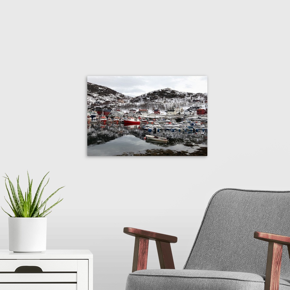 A modern room featuring Fishing boats in the harbour at Skjervoy, Troms, Norway, Scandinavia, Europe.
