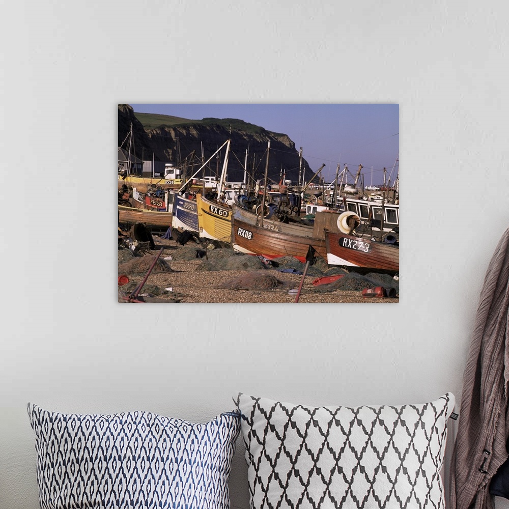 A bohemian room featuring Fishing boats on the beach, Hastings, East Sussex, England, UK