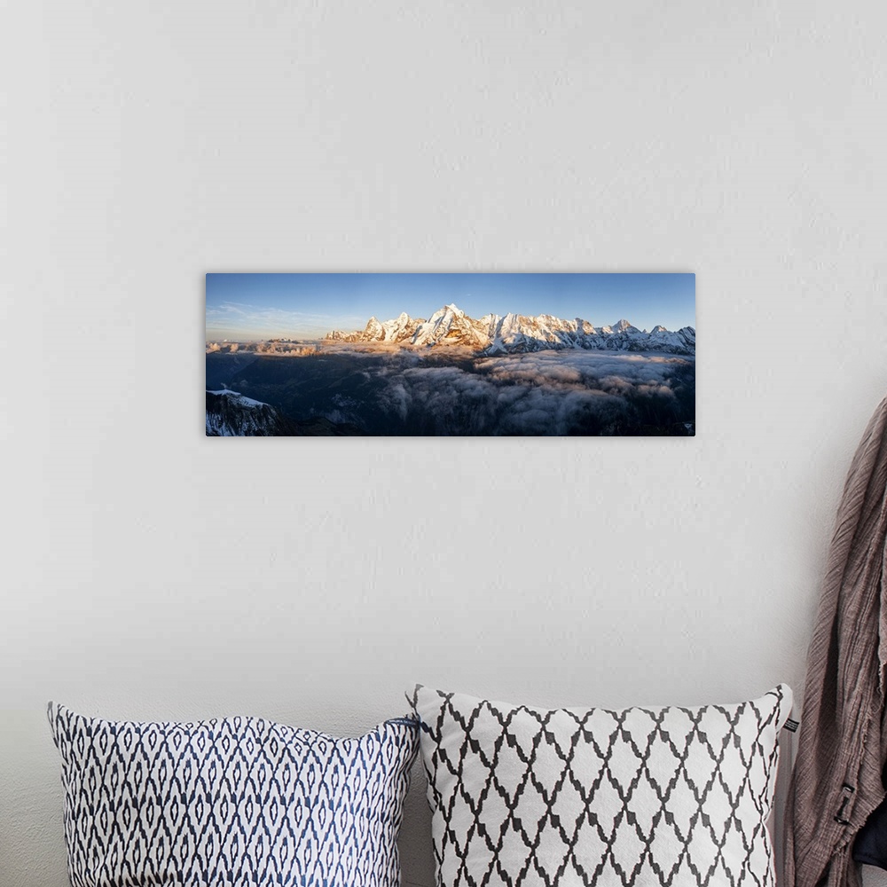 A bohemian room featuring Foggy sky at sunset over majestic rocks of Eiger, Monch and Jungfrau mountains, Murren Birg, Jung...