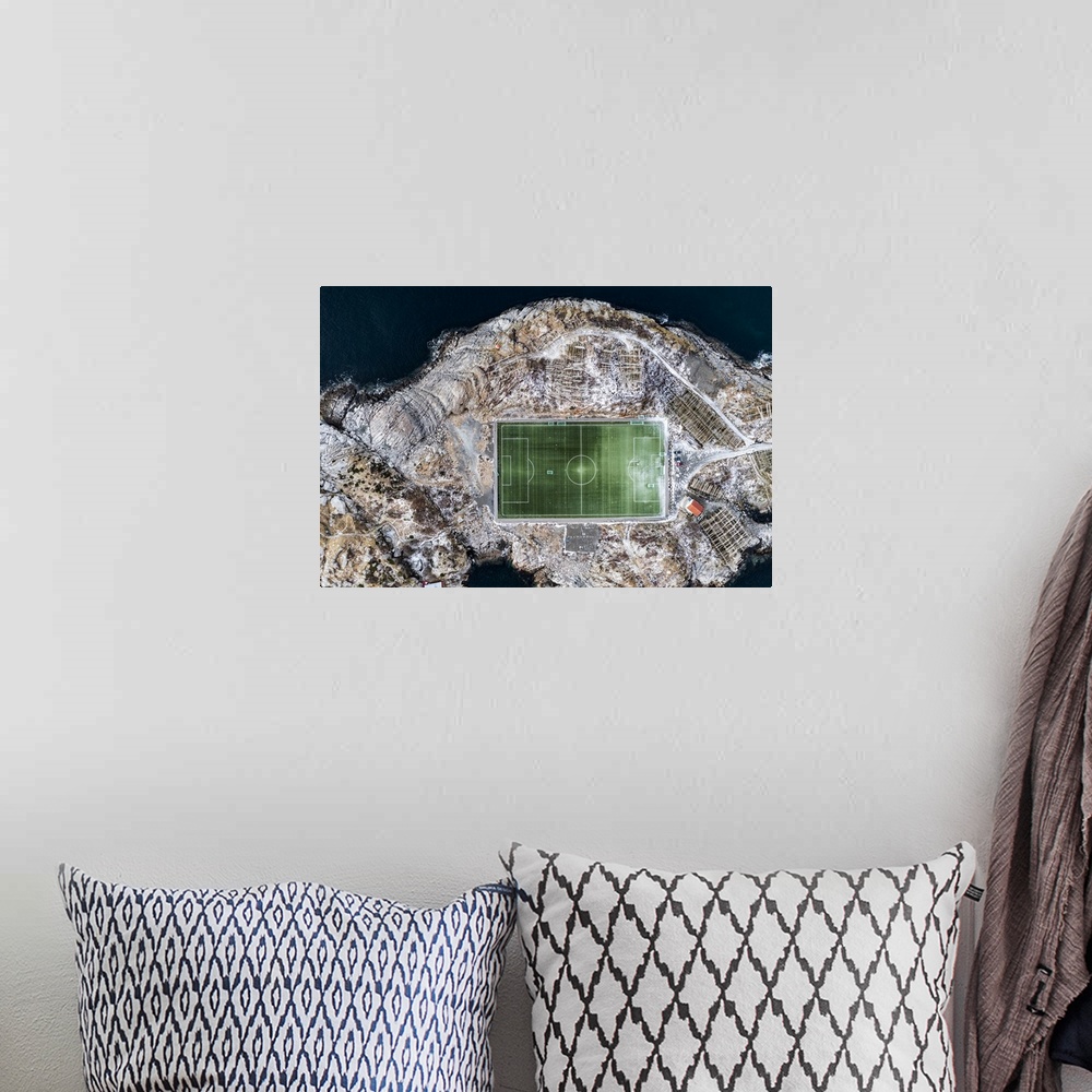 A bohemian room featuring Football field on islet from above, aerial view, Henningsvaer, Nordland county, Lofoten Islands, ...