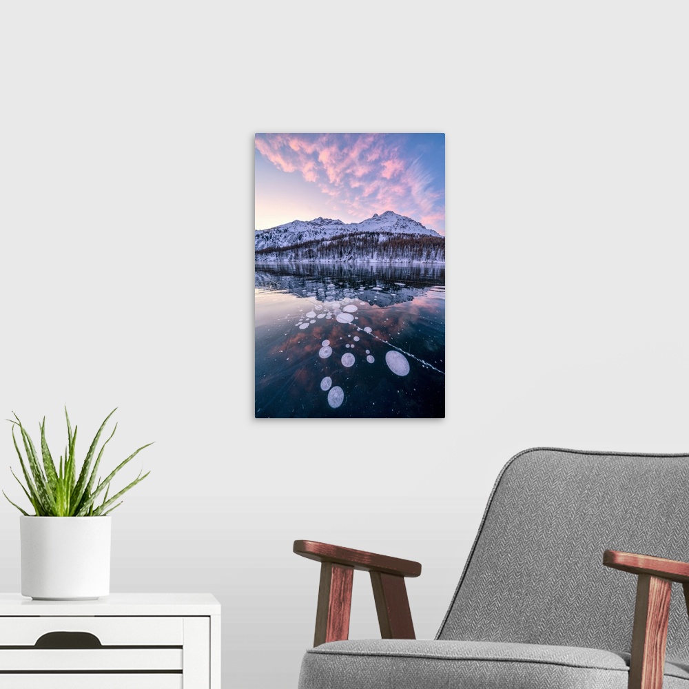A modern room featuring Frozen Lake Sils at sunrise with Piz Da La Margna in background, Engadine, canton of Graubunden, ...