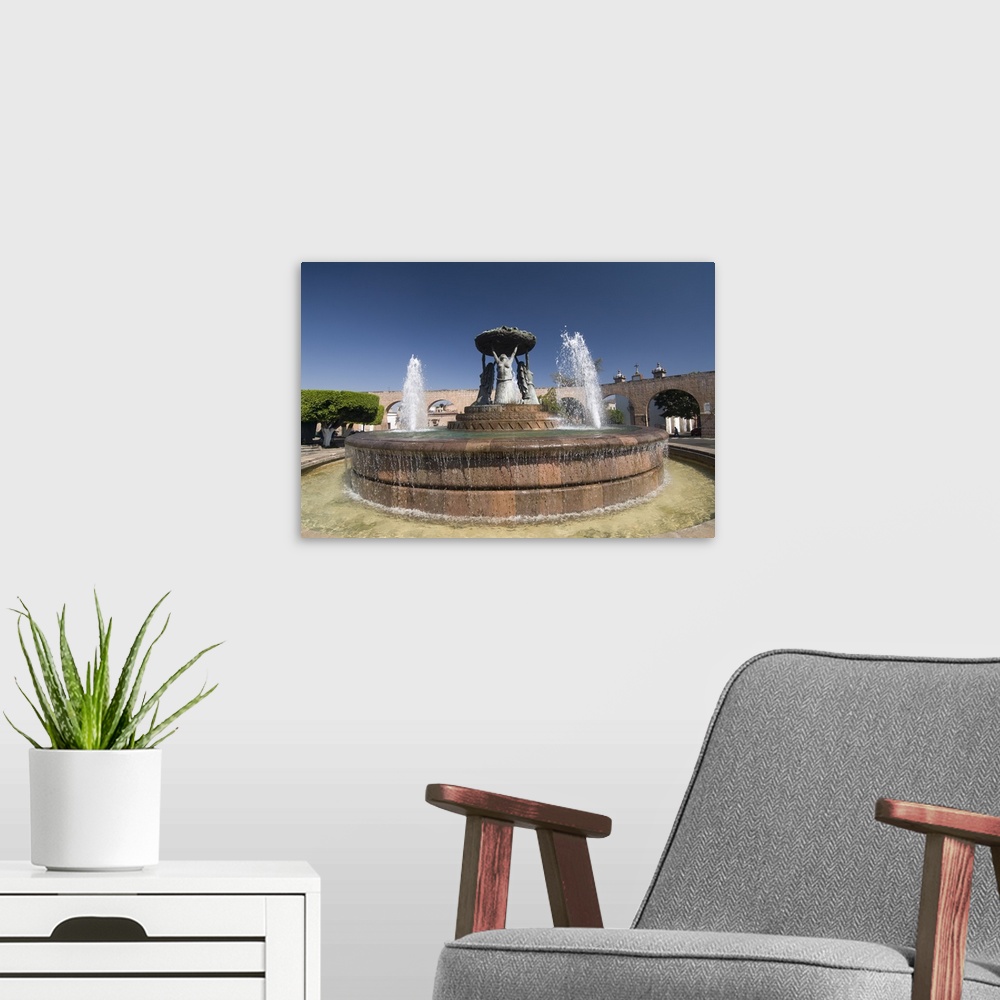 A modern room featuring Fuente Las Tarasca, a famous fountain, Morelia, Michoacan, Mexico