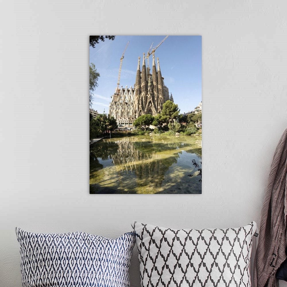 A bohemian room featuring Gaudi's Cathedral of La Sagrada Familia, still under construction, UNESCO World Heritage Site, Ba...