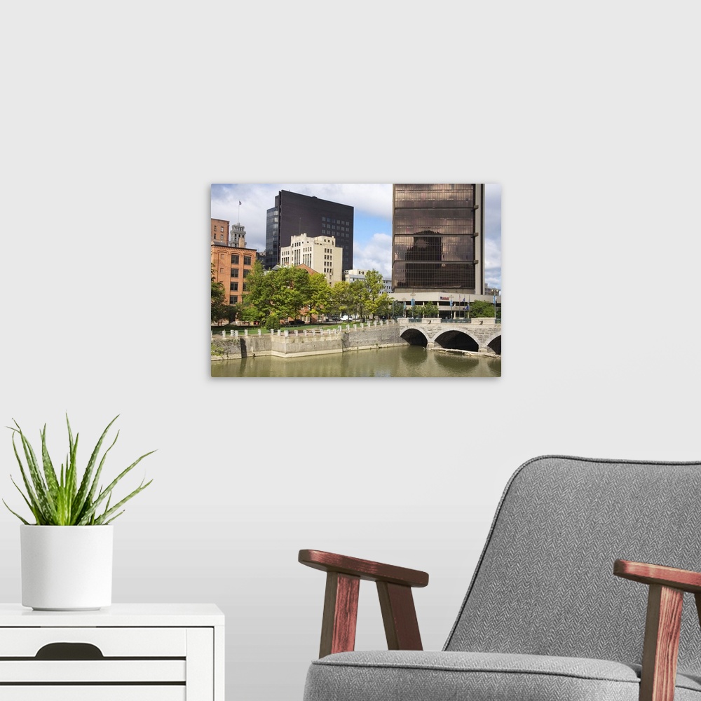 A modern room featuring Genesee River and city skyline, Rochester, New York State
