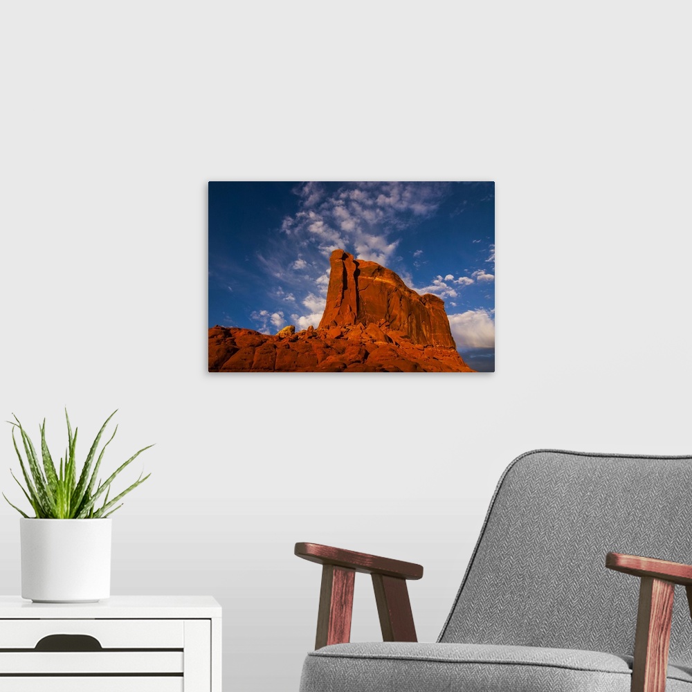 A modern room featuring Giant rock in the late afternoon light on top of a plateau near Moab, Utah