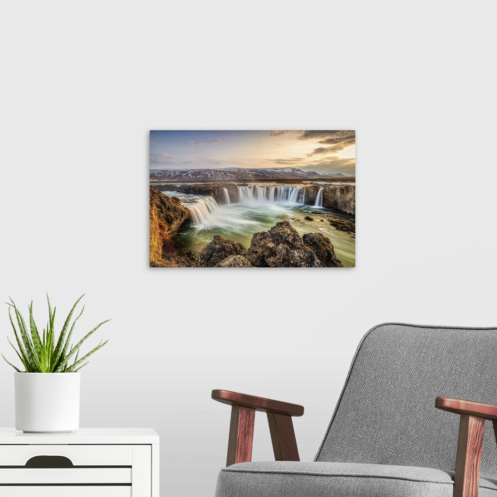 A modern room featuring Godafoss waterfall at sunrise, Northern Iceland, Polar Regions