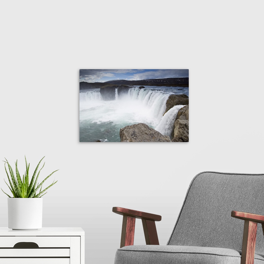 A modern room featuring Godafoss waterfalls, Iceland, Polar Regions