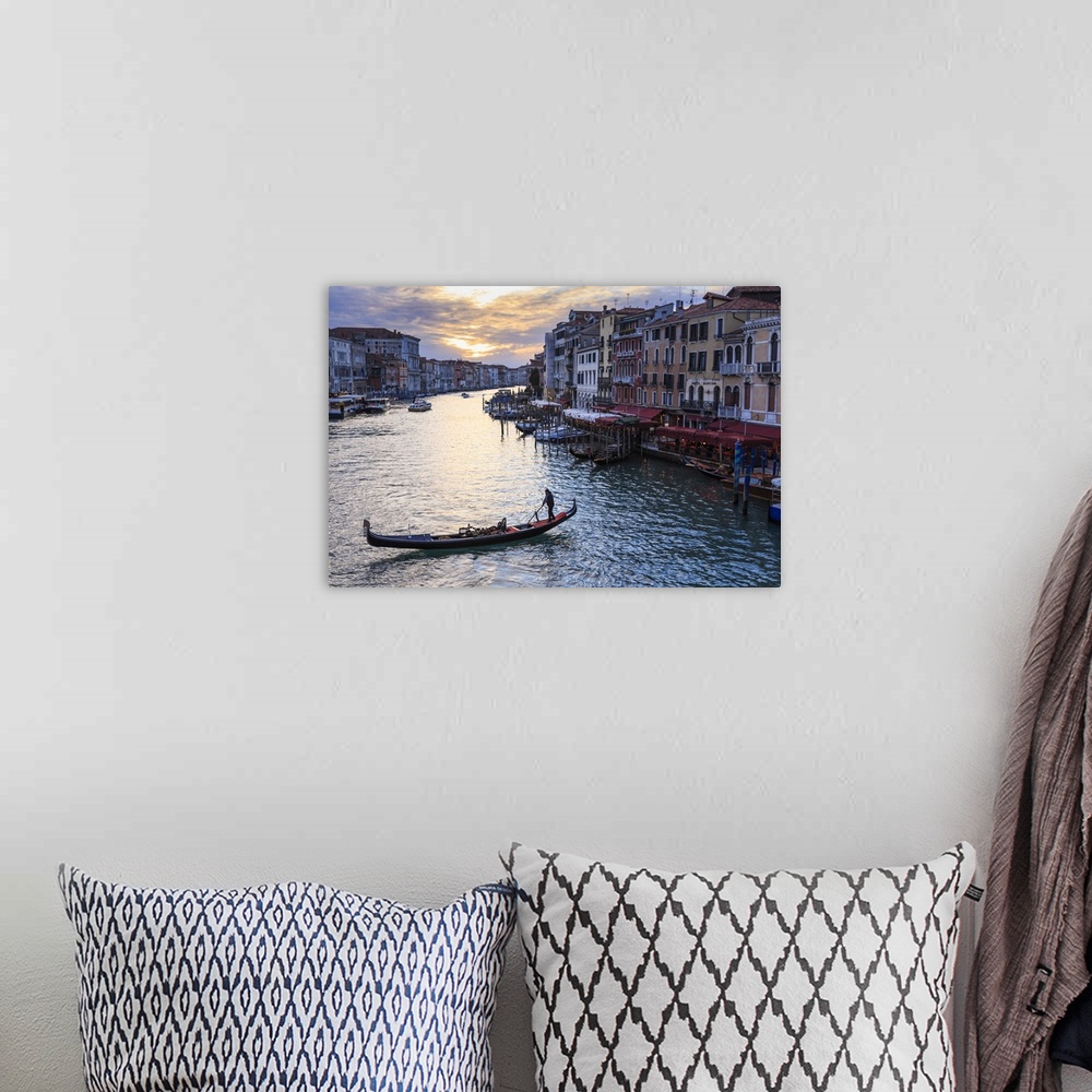 A bohemian room featuring Gondola on the Grand Canal at sunset in winter, from Rialto Bridge, Venice, Veneto, Italy