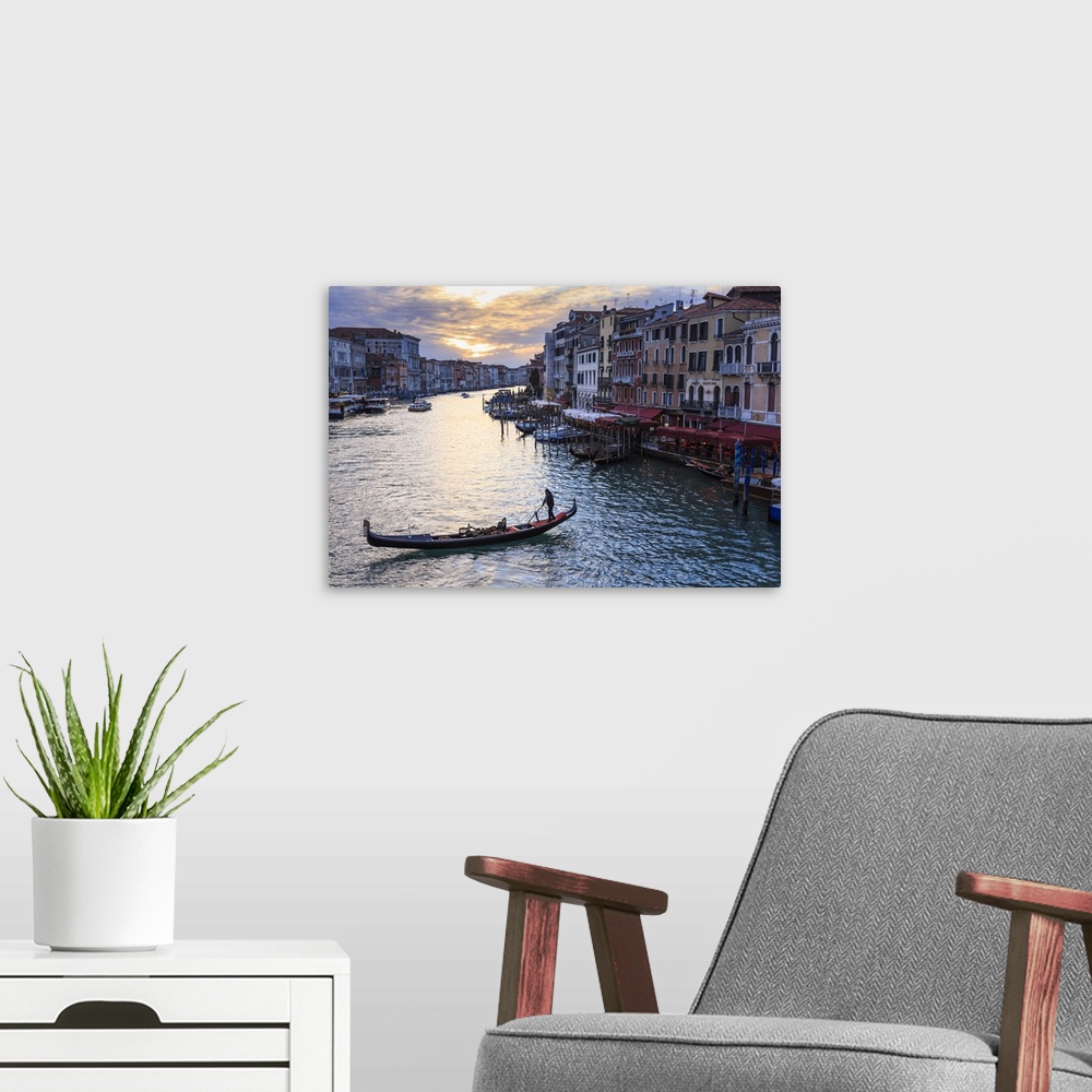 A modern room featuring Gondola on the Grand Canal at sunset in winter, from Rialto Bridge, Venice, Veneto, Italy