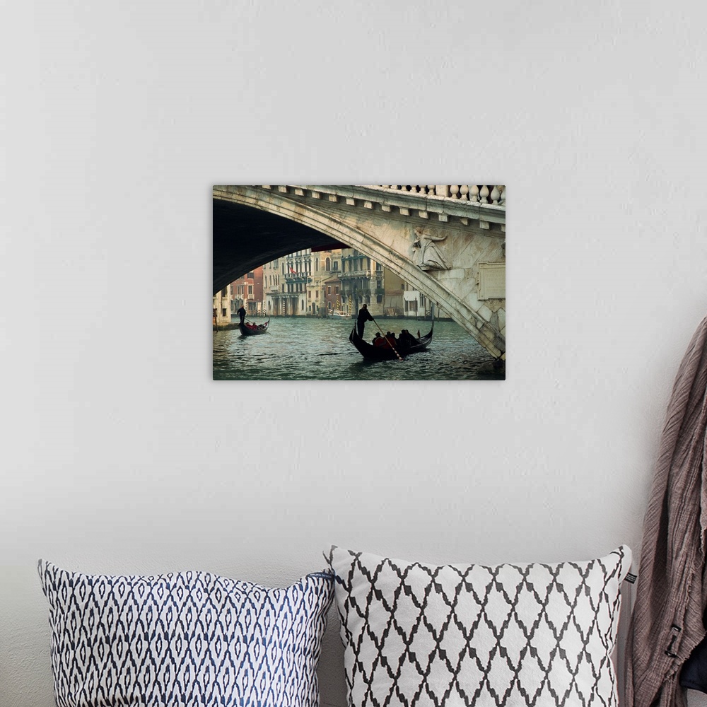 A bohemian room featuring Gondola under the Rialto Bridge on the Grand Canal in Venice, Italy