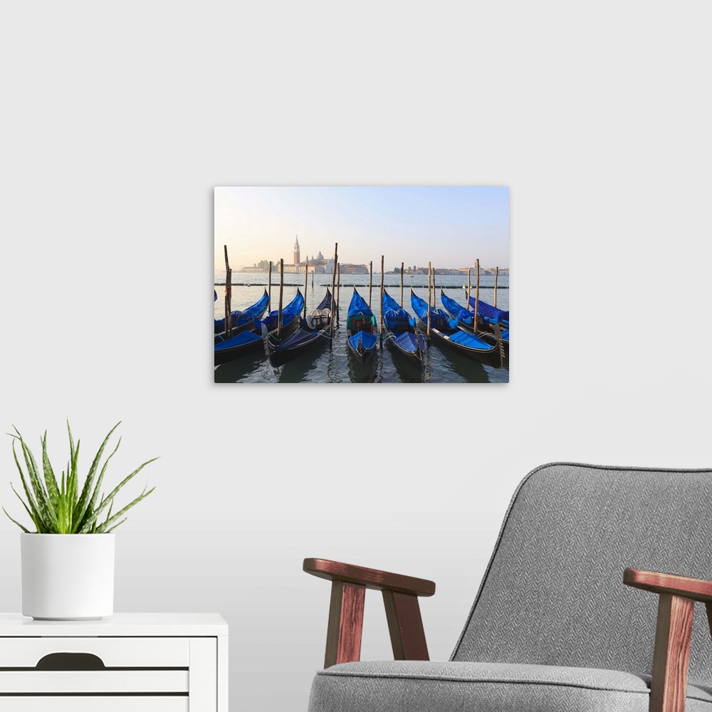 A modern room featuring Gondolas on the Lagoon, San Giorgio Maggiore in the distance, Venice, Veneto, Italy