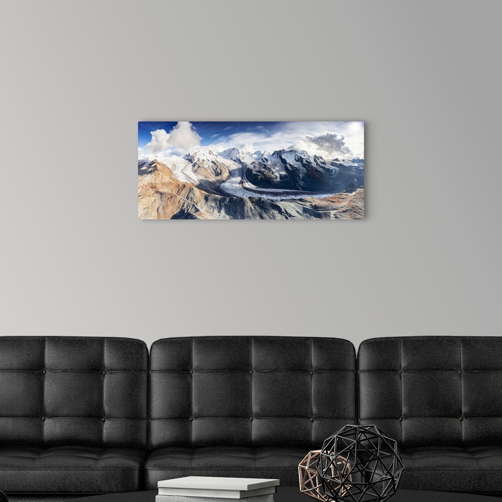 A modern room featuring Aerial panoramic view of Gorner Glacier, Lyskamm, Monte Rosa, Castor and Pollux mountains, Zermat...
