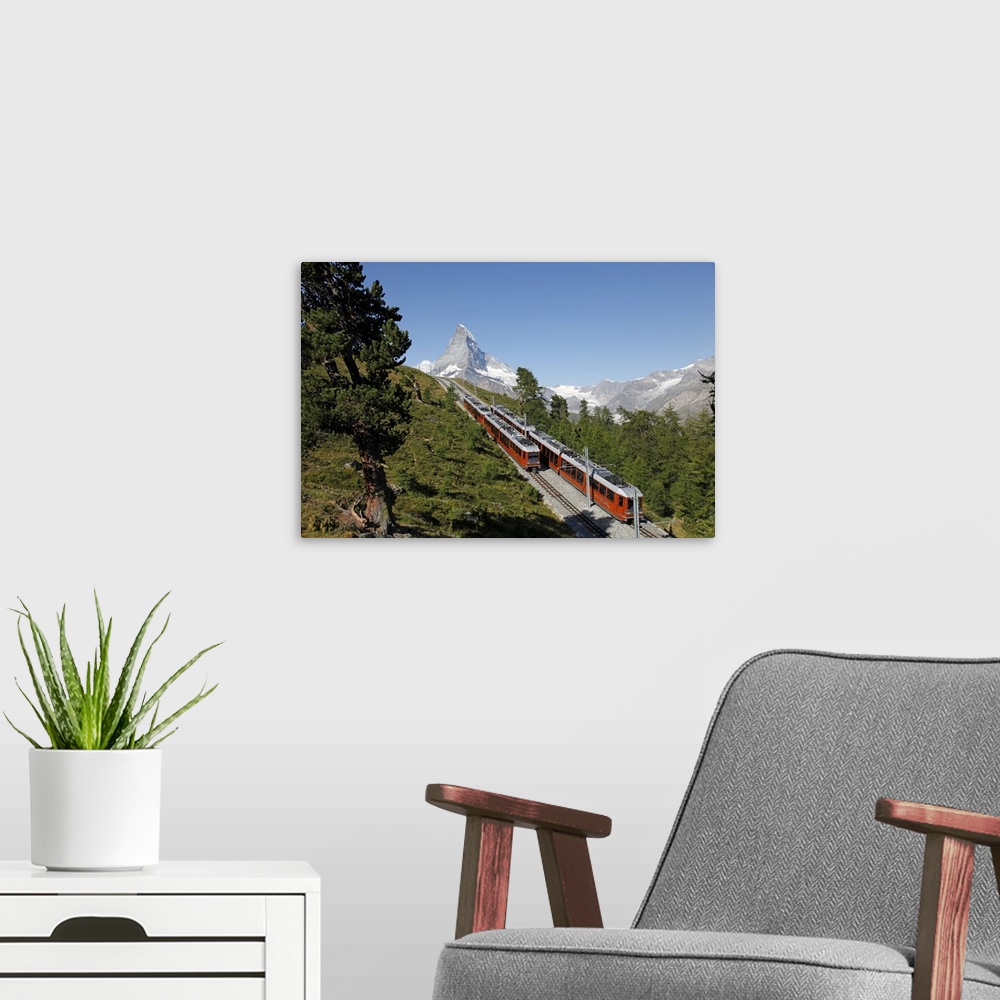 A modern room featuring Gornergrat Railway in front of the Matterhorn, Valais, Swiss Alps, Switzerland