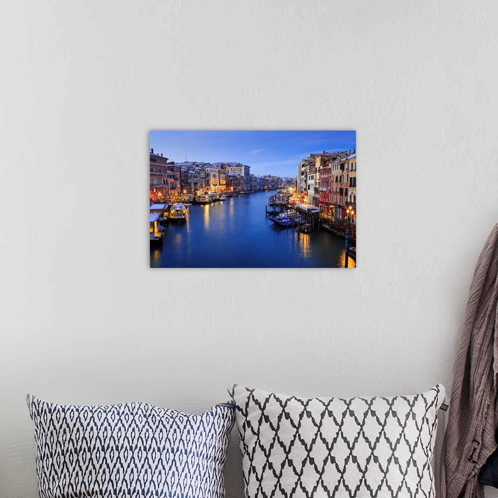 A bohemian room featuring Grand Canal from Rialto Bridge after overnight snow, dawn blue hour, Venice, Veneto, Italy